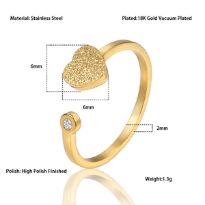 Detail of 18K gold plated stainless steel ring with 6mm frosted heart and crystal