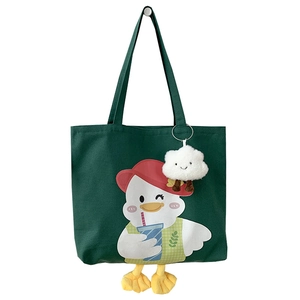 Green canvas tote bag with cute cartoon duck pattern and 3D plush feet decoration