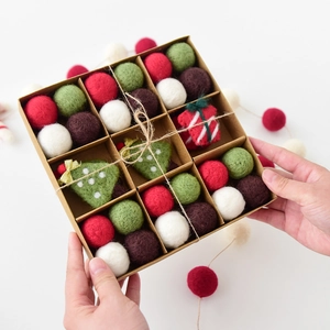Handcrafted wool felt Christmas ball set with tree ornaments in a rustic gift box