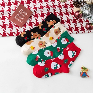 Festive Christmas mid-calf socks set featuring cartoon reindeer, snowman and Santa patterns