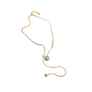 Minimalist gold Y-necklace with grey pearl pendant on elegant snake chain for women