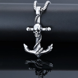 Silver anchor skull pendant necklace in punk style on a reflective black display stand