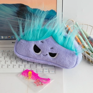 Close-up of a purple plush stationery bag featuring a funny face and fuzzy hair details