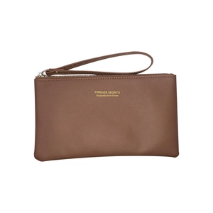Brown rectangular leather long wallet with wristlet strap and gold lettering on white base