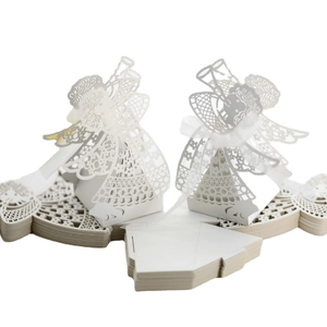 Laser-cut white angel favor boxes with elegant ribbons for wedding candy packaging