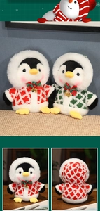 Detail of Christmas penguin plush toys with red and green knitted sweaters and tiny golden bells