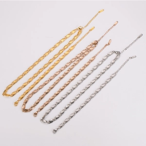 Polished paperclip chain necklaces in gold, rose gold and silver on white background