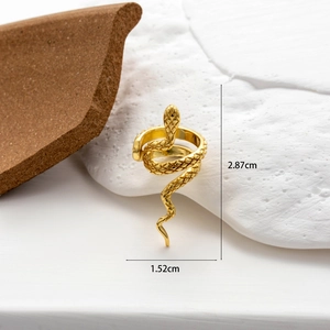 Golden snake-shaped copper ring with intricate scale texture and zircon inlay jewelry