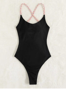 One-piece swimsuit with colorful braided cross-straps and high-cut leg in black