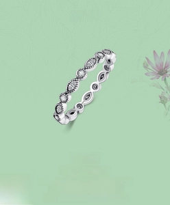 Close-up of S925 sterling silver ring with marquise zircon and vintage beaded edges