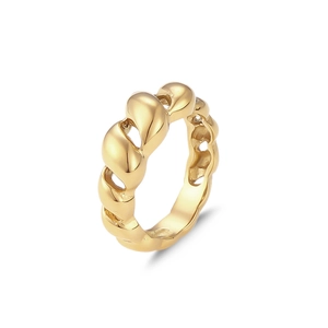 Close-up of a golden hollow heart ring with a twisted croissant band design