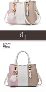 Detailed view of the tricolor faux leather handbag with metal bow and plush ball charm
