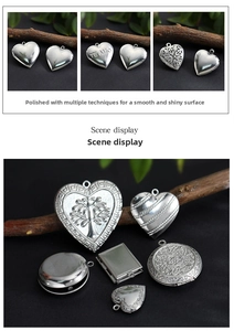 Detail of vintage heart-shaped photo locket pendants with intricate floral engravings