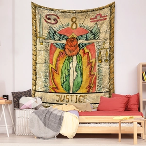 Detailed view of the Justice tarot tapestry hanging as a bohemian wall decoration