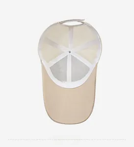 Internal view showing reinforced seams and breathable mesh of the beige sun hat