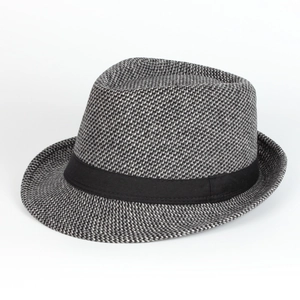 Close-up of the grey herringbone wool texture and black ribbon band of this trilby hat