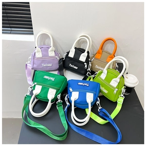 Detailed collection of mini nylon crossbody bags for kids in six vibrant contrast colors