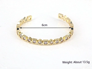 Detail of gold-plated open bangle featuring zircon inlay, inner diameter 6cm, weight 13.5g