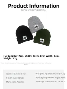 Close-up of knit hats with tractor patch detail showing size and material specifications