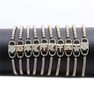 Rainbow cubic zirconia woven bracelets with heart, star and moon charms in three metal tones