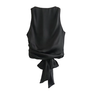 Elegant black satin backless top featuring a large bow detail and sleeveless design