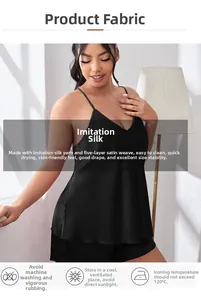 Detail of black satin pajama set showing smooth silk-like texture and breathable fabric