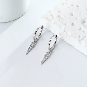 Detailed view of S925 sterling silver hoop earrings with sparkling zircon triangle pendants