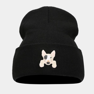 Close-up of a black ribbed beanie featuring a detailed white bull terrier dog embroidery