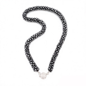 Elegant multi-strand beaded necklace with sparkling grey crystals and a diamond-set clasp