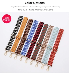 Detail view of nine colorful wide houndstooth bag straps with golden metal hooks and buckles