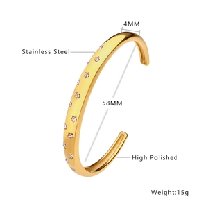 Polished stainless steel cuff bracelet for women featuring star zirconia stones