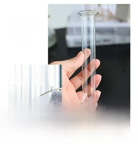 Close-up of slim clear glass test tube vase for hydroponic plants in home decor