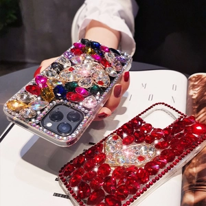 Close-up of heart-shaped diamond phone case with luxury rhinestone inlay for iPhone 16 Pro Max