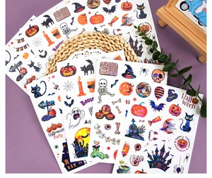 Close-up of laser holographic Halloween stickers featuring colorful pumpkin and ghost designs