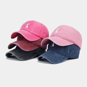Collection of vintage washed cotton baseball caps with rabbit embroidery in five colors