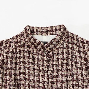 Women's tweed jacket with red and black plaid pattern and stylish stand-up collar detail
