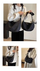 Waterproof nylon crescent bag detail showing large and small sizes worn by model