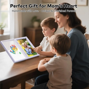 Detail of DIY folding photo frame with colorful handprints for family memories