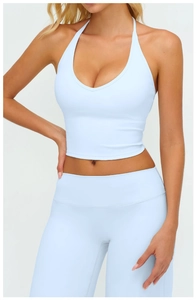 Close-up of light blue halter V-neck sports bra and high-waist leggings yoga set