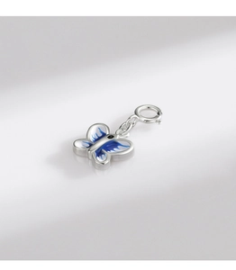 Detail of 925 sterling silver butterfly charm with blue enamel and lobster clasp