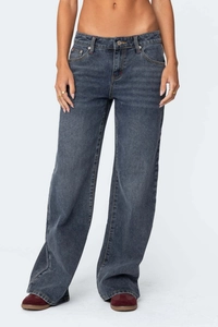 Detail view of retro wide-leg denim jeans in dark grey with high-quality fabric texture