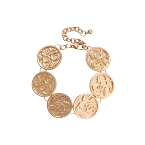 Elegant gold metal bracelet with embossed circular textured charms and lobster clasp closure