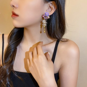 Elegant vintage long drop floral earrings with purple crystals and pearl bead tassels