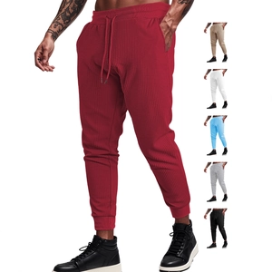 Men's waffle knit jogger pants with drawstring waist shown in multiple colors