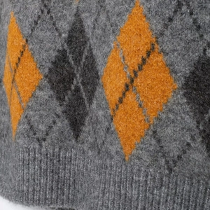 Vintage argyle knit sweater vest in grey and orange with rib-knit hem details