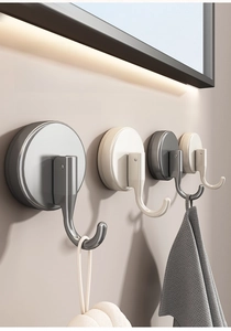 L-shaped heavy duty vacuum suction hooks in silver and white shown in a modern bathroom