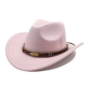 Pink wool cowboy hat detail with brown braided band, gold feather charm and beads