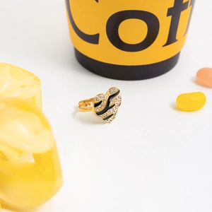 Adjustable golden heart ring with sparkling rhinestones and black enamel stripes