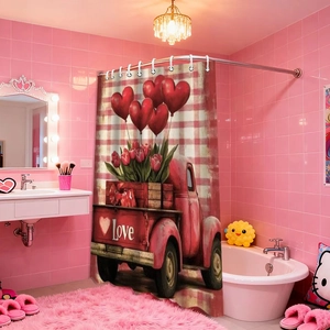 Detail of Valentines Day bathroom curtain with red vintage truck and heart balloon pattern
