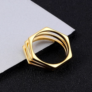 Golden titanium steel ring featuring a stylish multilayer hexagonal geometric design